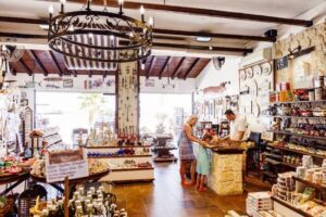 a family wandering around the gift shop