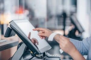 woman using pos system